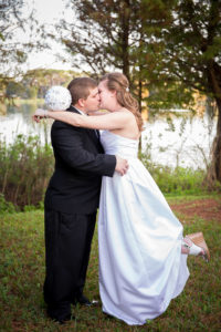 Bride Kissing Groom w: Leg Up